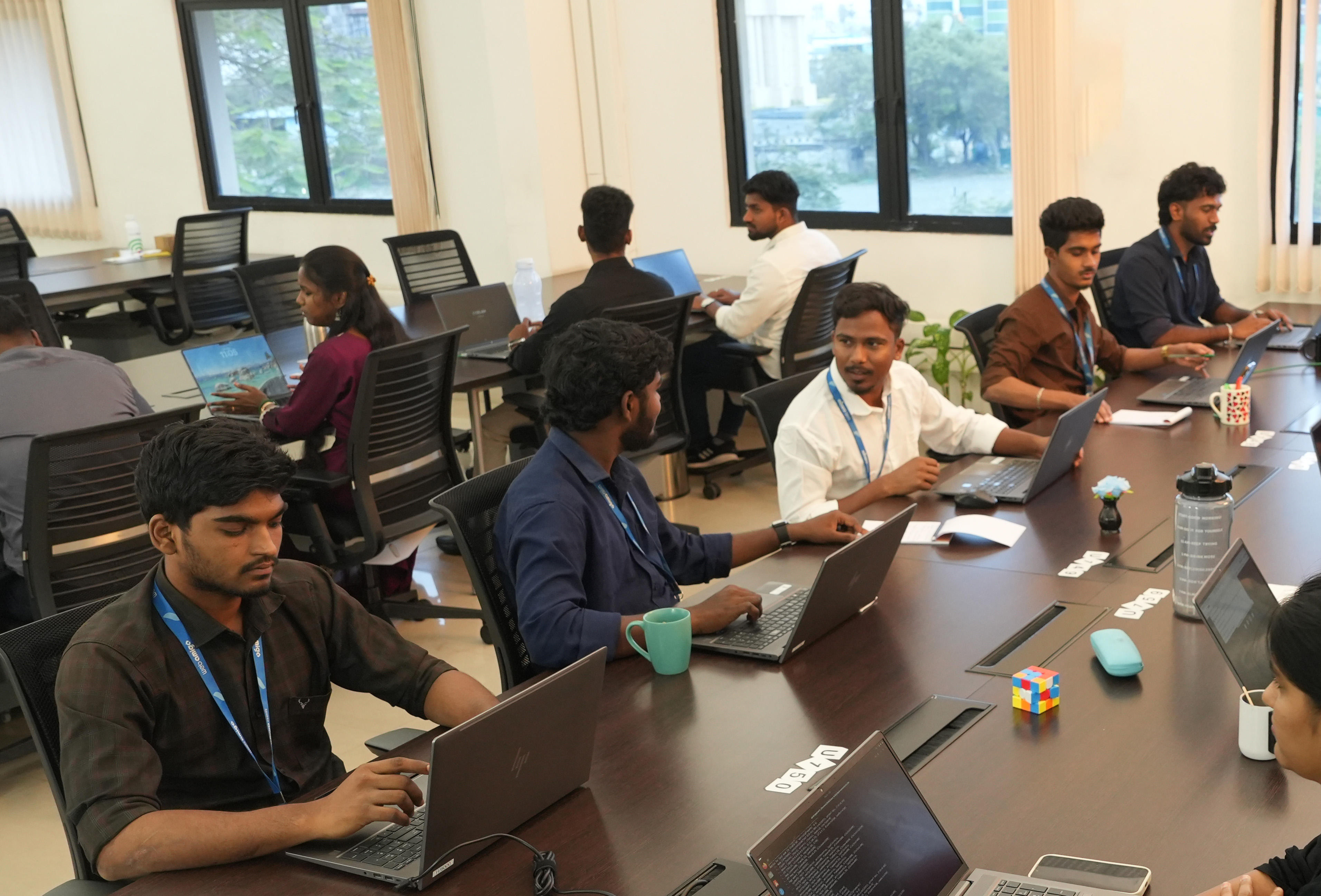 WebAmigo team at their desks